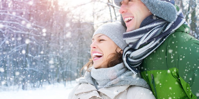 Winter couple. Happy Couple Having Fun Outdoors. Snow. Winter Vacation. Outdoor