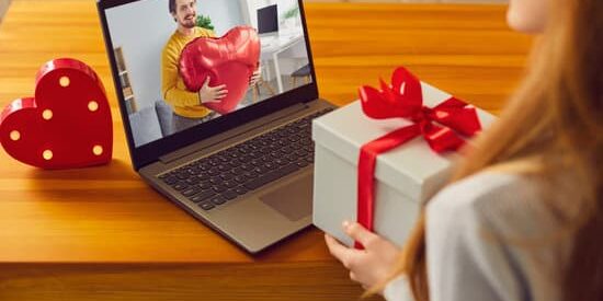 canva-young-man-and-woman-in-love-showing-each-other-valentine-presents-on-virtual-date-MAEN_NFiWCQ